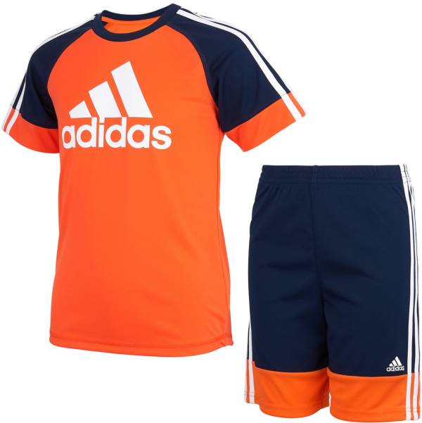 orange top and shorts with black... addidas childrens football kit aged 9 to 10 