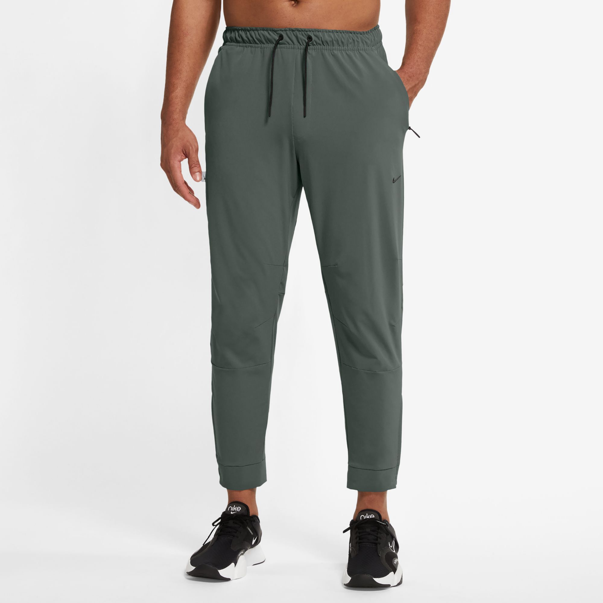 nike dress pants mens Club Men's Woven Tapered These tapered joggers help keep sweat away throughout your workout Nike Unlimited Men's Dri-FIT Zippered