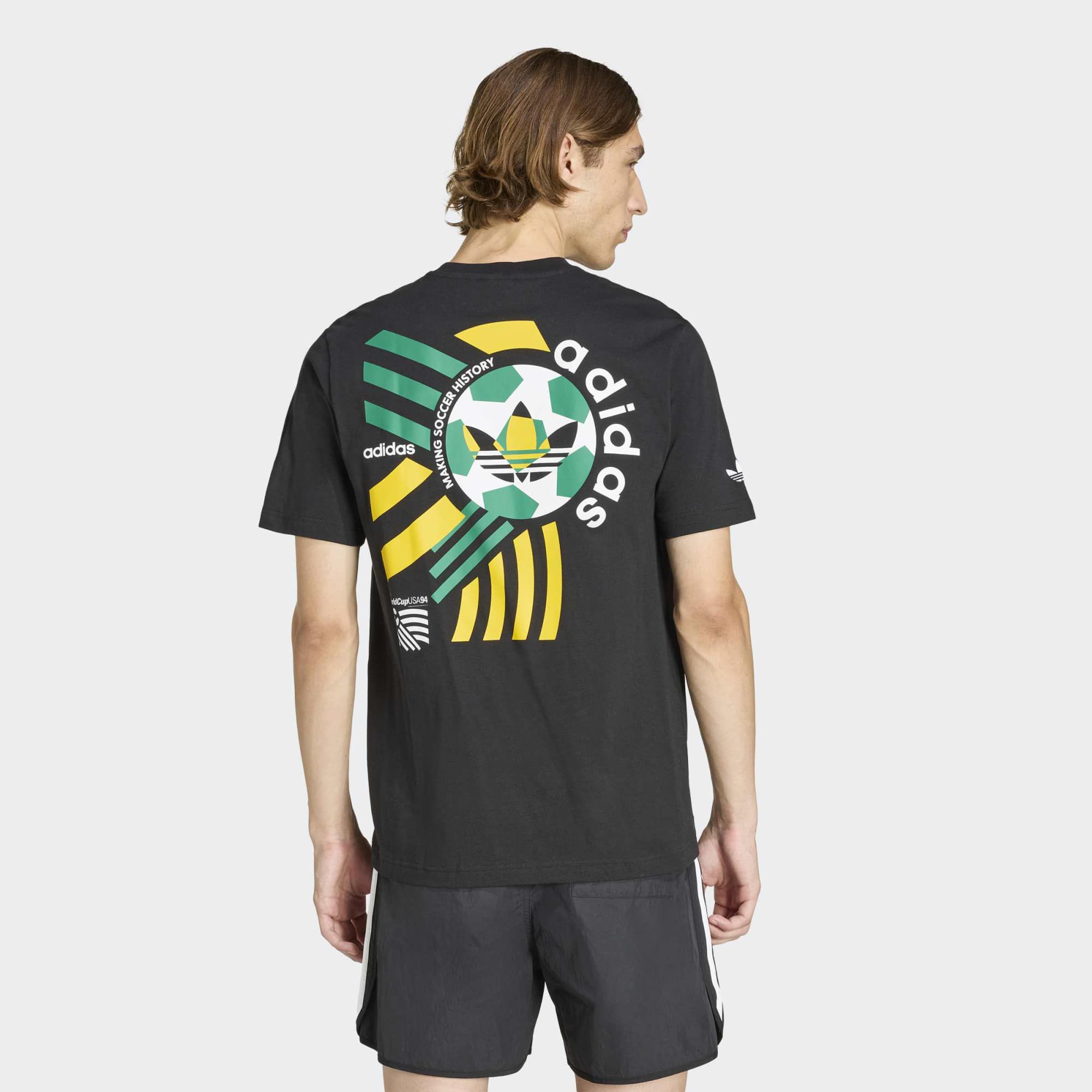 ビンテージ  オーバーサイズ フットボールシャツ 万国旗 adidas Men's Archive Soccer History Graphic T-Shirt | Dick's