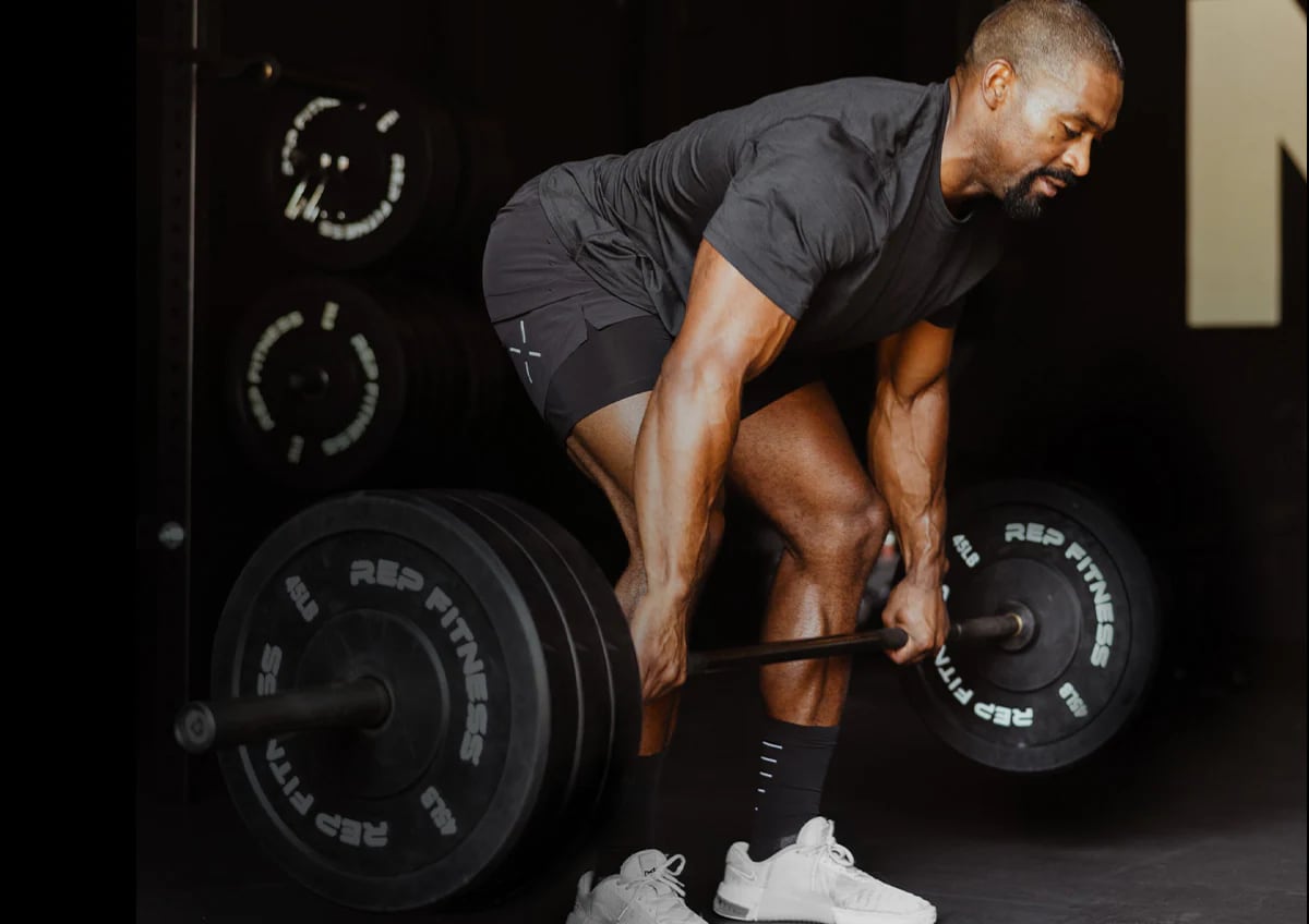 Man working out in Ten Thousand brand clothing.