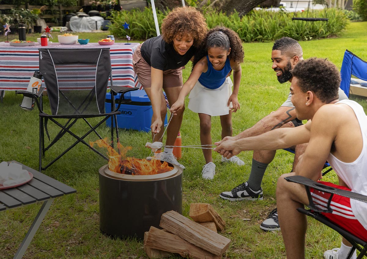 Image features the cookwear, utensils and more for cooking up something good outdoors.