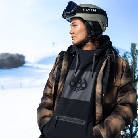 A person in snow gear outside.