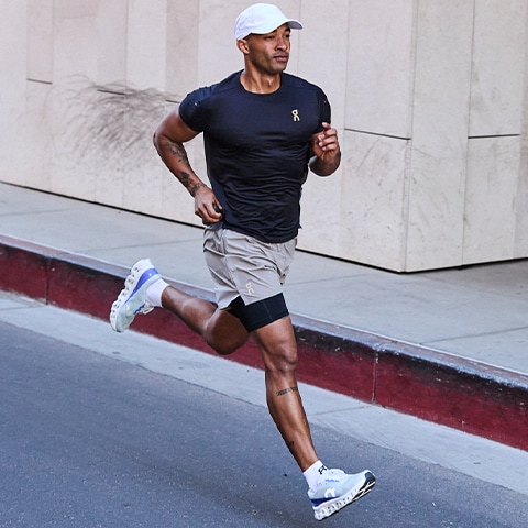 Man running in training gear.