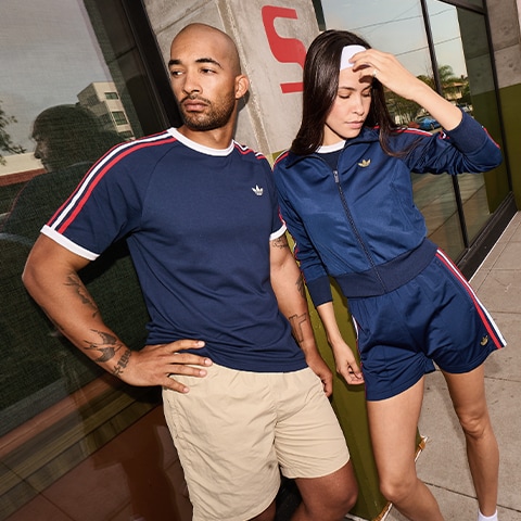 Two people in World Cup clothing.