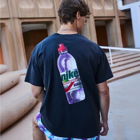 A man in a graphic tee.