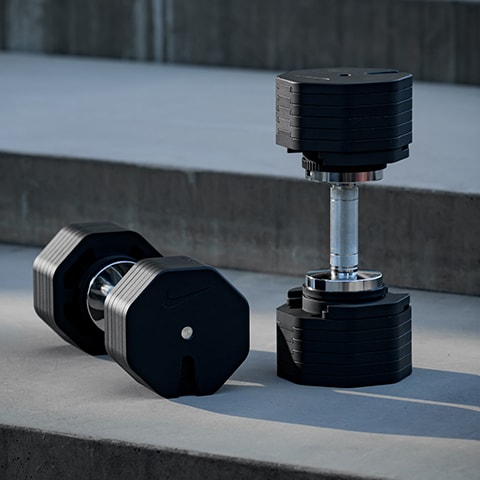 A set up Nike brand adjustable dumbbells