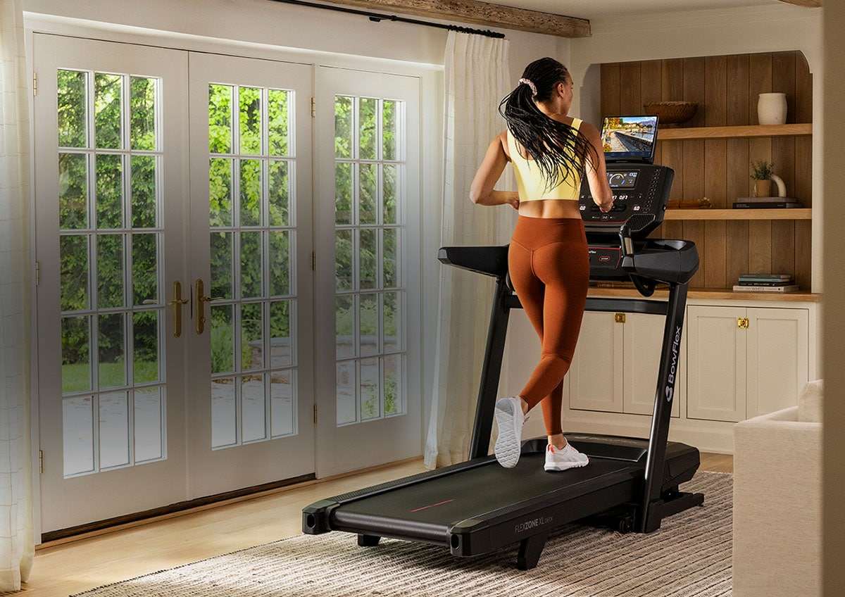 A woman running on a treadmill