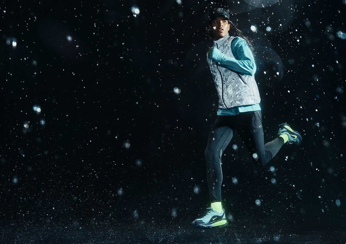 Person running in the winter wearing Nike Vomero 18 GTX shoes.
