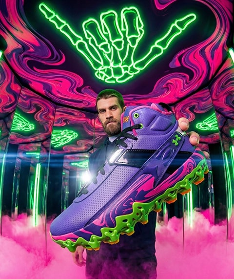 Bryce Harper holding new cleat.