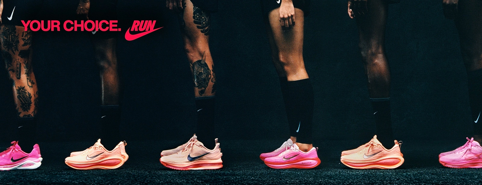 Line up of people wearing Nike shoes.