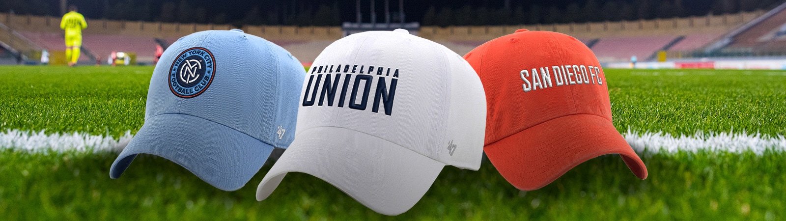 MLS Hats and scarf on soccer field