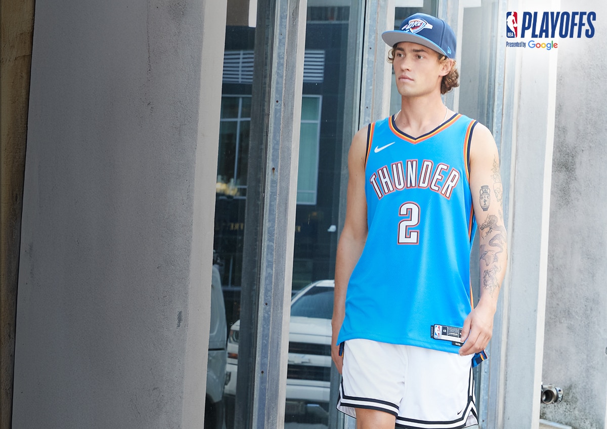 NBA fan wearing official NBA gear