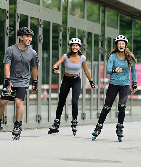People riding rollerblades.