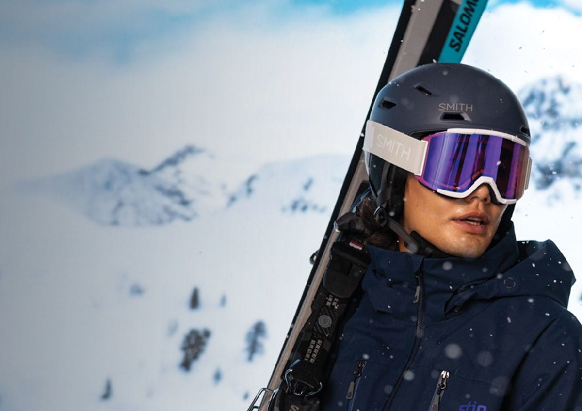 Skier with helmet and goggles.