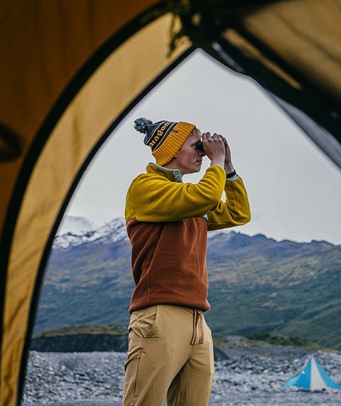 Man Holding Binoculars