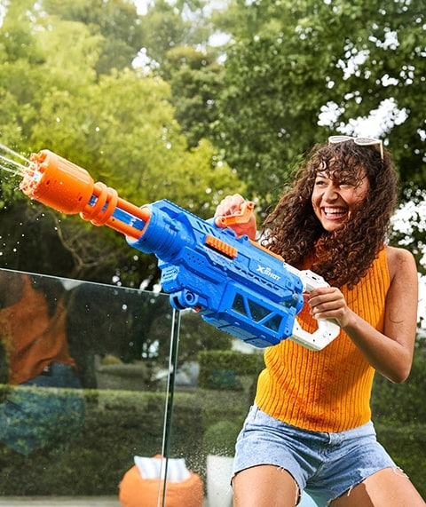 Woman with water cannon.