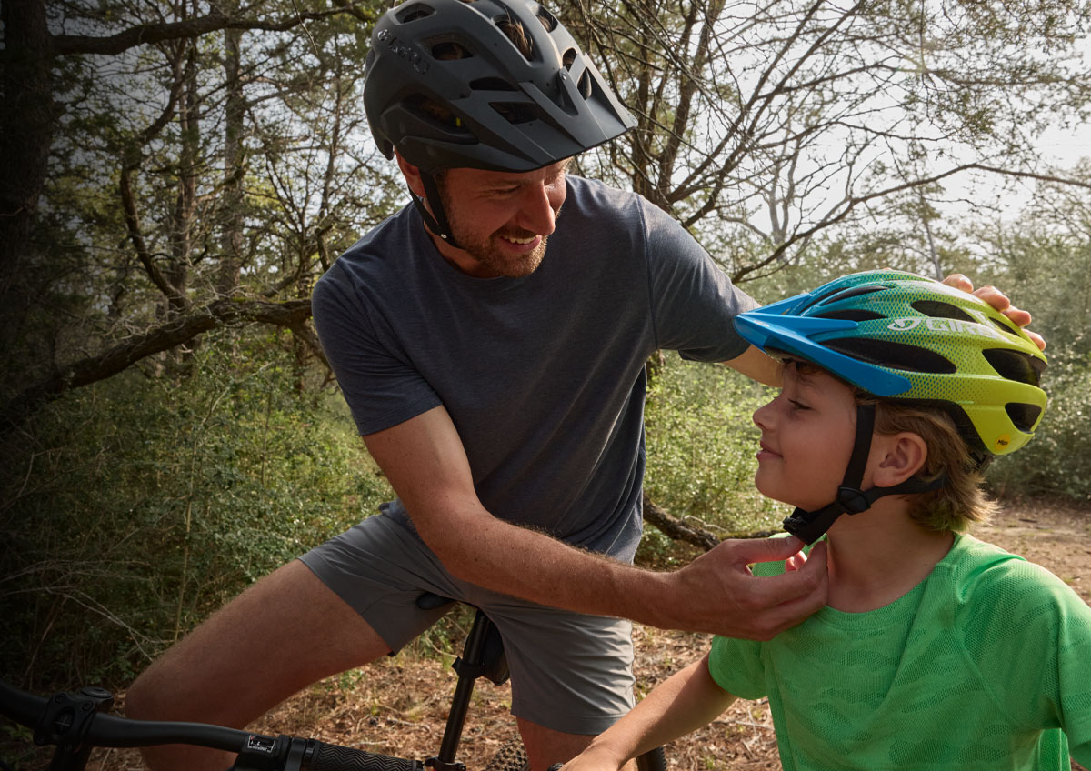 People riding bikes and wearing biking gear.