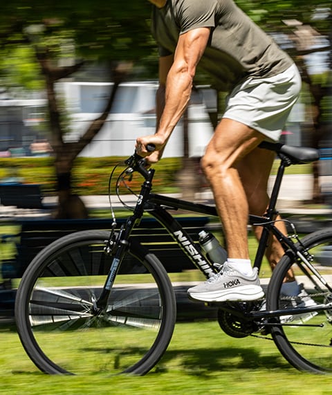 Man on bicycle.