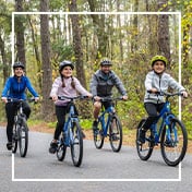 Family riding bikes together.
