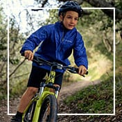 Boy riding a bike.