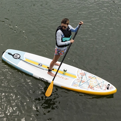 Woman on a paddle board.