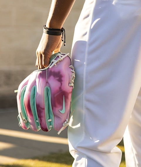 Baseball player with Nike ball glove.