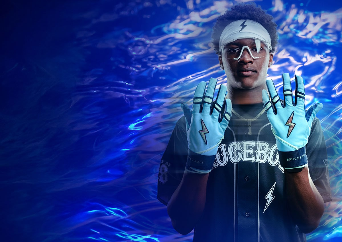 Baseball player showing back of gloves.