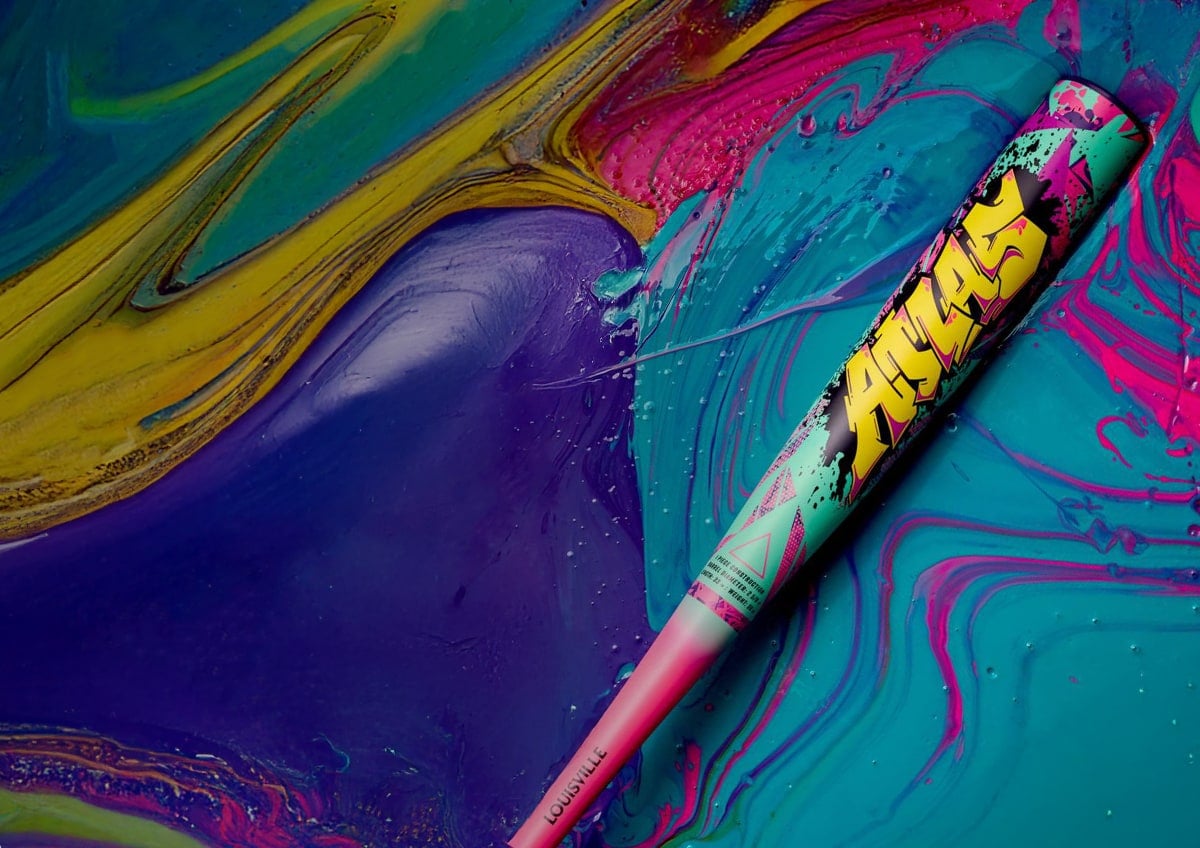 Louisville slugger bat on a colorful background.