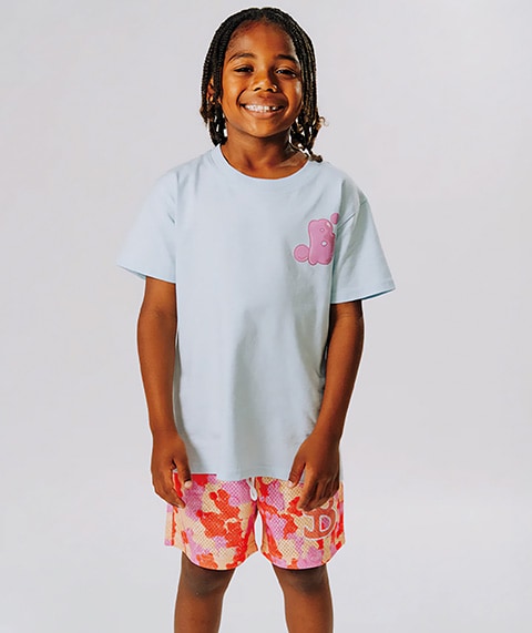 Boy wearing Bucketsquad tee.