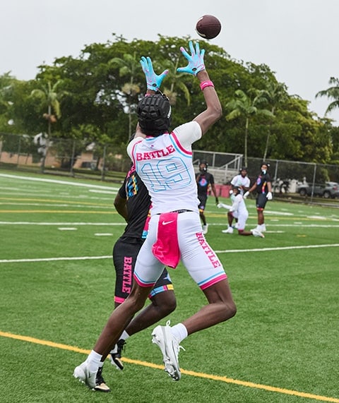 Football players on field.