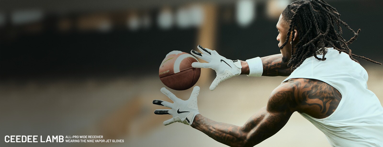 CeeDee Lamb, ALL-PRO WIDE RECEIVER WEARING THE NIKE VAPOR JET GLOVES.