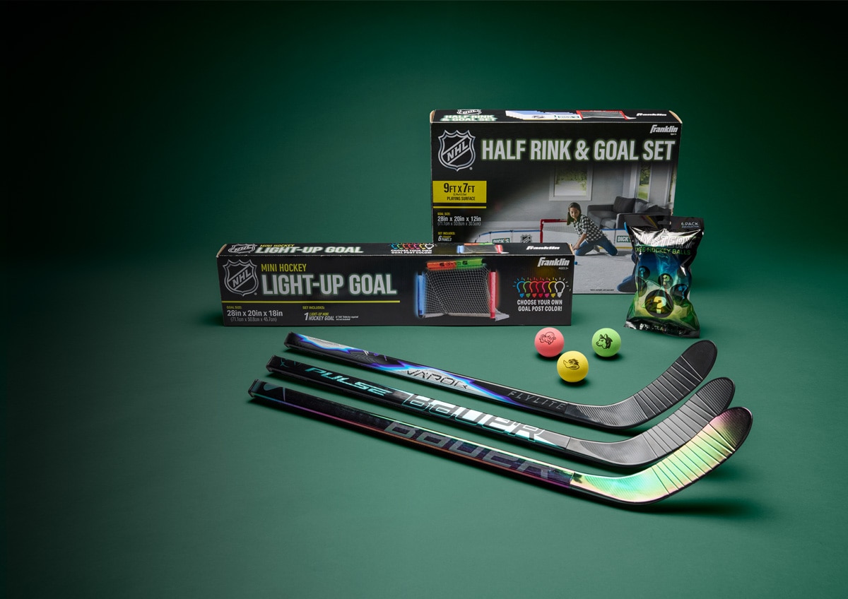 hockey sticks on green background