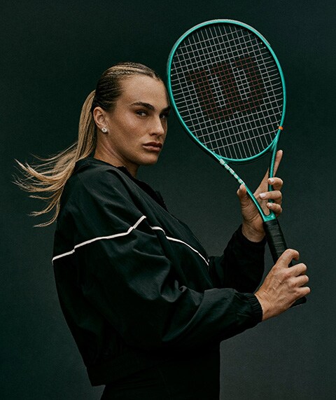 Aryna Sabalenka with tennis racquet.