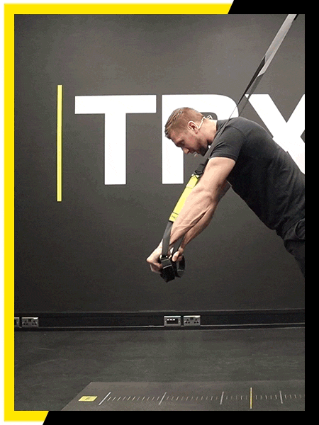 Image features a gif of an athlete using the TRX system.