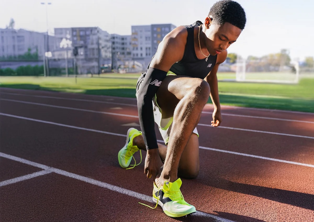 Quincy wearing New Balance MDX Track Spikes.