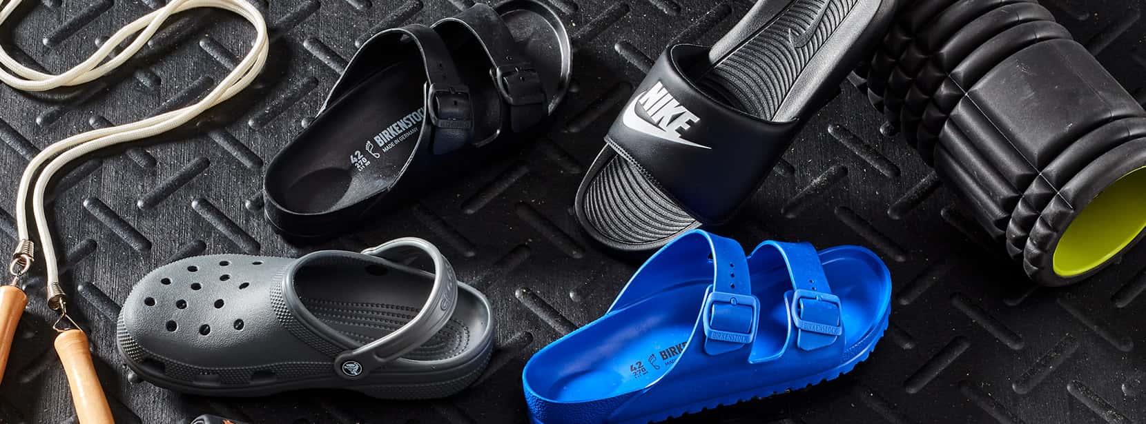 Image features various styles of recovery footwear