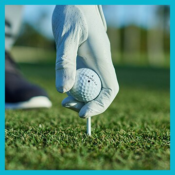 An image of a golf ball on a tee.