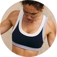 A woman wearing a FP Movement Sports Bra.