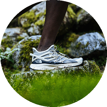 A close up of a runners' shoe.