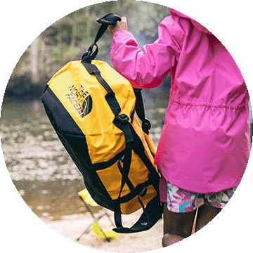 A girl carrying a North Face backpack