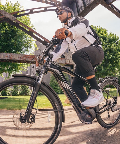 man riding bike outside