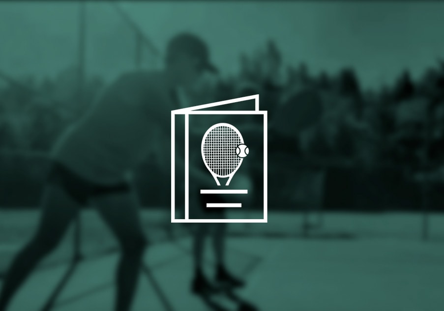 couple on court playing pickleball.