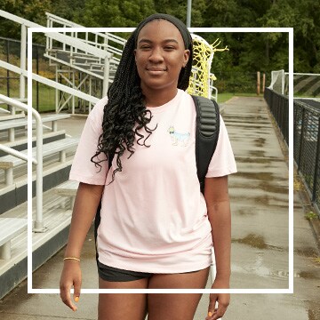 A woman wearing lacrosse apparel