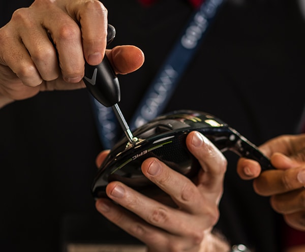A Golf Pro Customizing A Driver