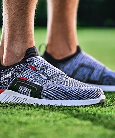 A Pair Of FootJoy HyperFlex Golf Shoes