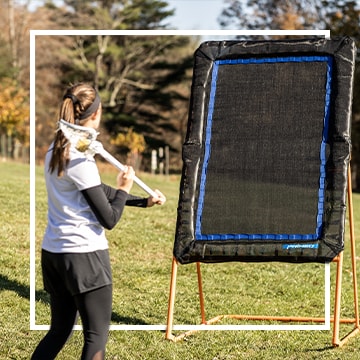 Image of lacrosse player with training net