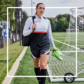 Image of athlete walking on soccer field