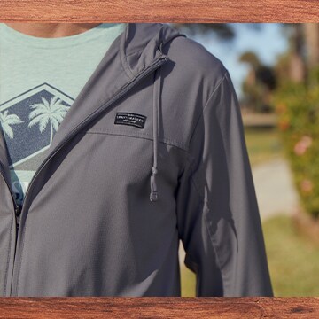 An image of a TravisMathew golf jacket.