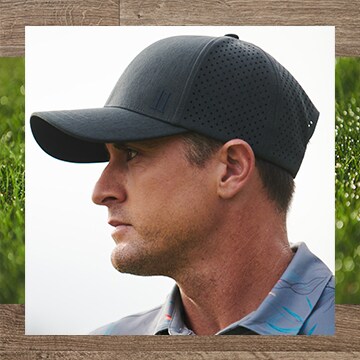 Image features a golfer wearing a hat.