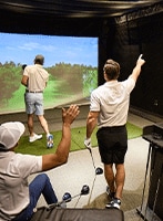 Group of golfers enjoying a virtual round of golf